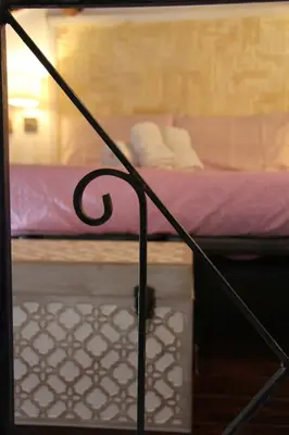 Letto o letti in una camera di Casa Magica