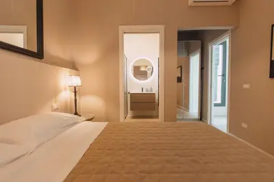 Letto o letti in una camera di Dimora Crocefisso