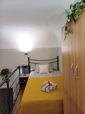 Letto o letti in una camera di Domus Bella Civita Very central apartment in the historic area of Catania