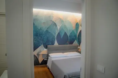 Letto o letti in una camera di Almond Apartments - Plebiscito