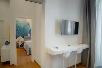 TV o dispositivi per l'intrattenimento presso Almond Apartments - Plebiscito
