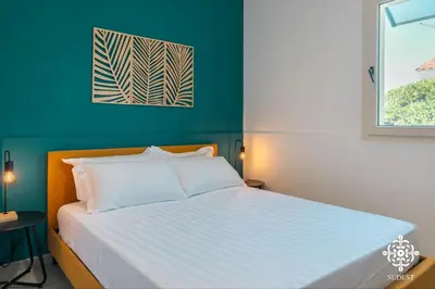 Letto o letti in una camera di Villa Due Mari - Seaside retreat with private pool