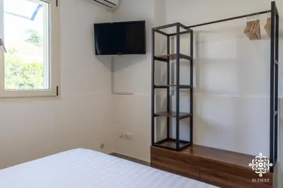 Letto o letti in una camera di Villa Due Mari - Seaside retreat with private pool