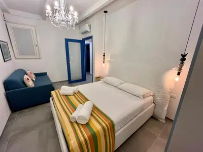 Letto o letti in una camera di Casuzza Maria