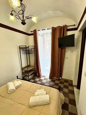 Letto o letti in una camera di Civico Venti Catania