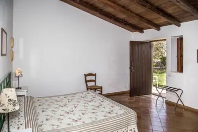 Letto o letti in una camera di Pozzo Di Mazza