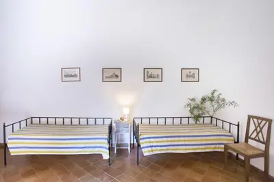 Letto o letti in una camera di Pozzo Di Mazza