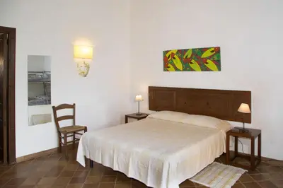 Letto o letti in una camera di Pozzo Di Mazza