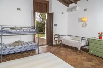Letto o letti in una camera di Pozzo Di Mazza