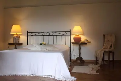 Letto o letti in una camera di Pozzo Di Mazza