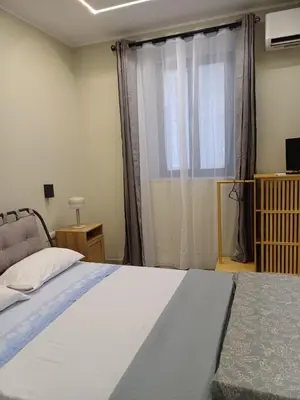 Letto o letti in una camera di Dimora Lilli e Silvia