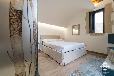 Letto o letti in una camera di Aretusa Boutique Home