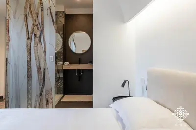Letto o letti in una camera di Aretusa Boutique Home
