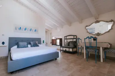 Letto o letti in una camera di Le Nereidi