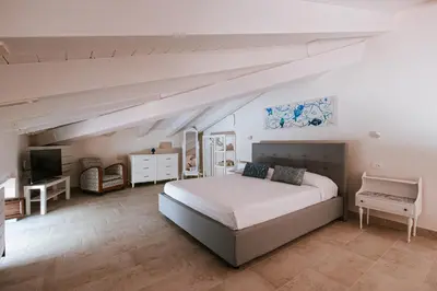 Letto o letti in una camera di Le Nereidi