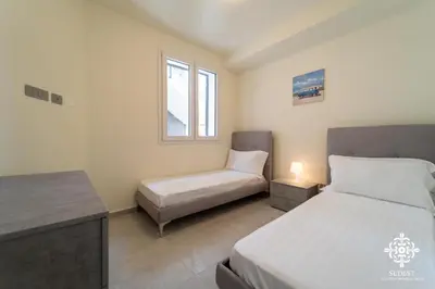 Letto o letti in una camera di Portopalo Comfort Suite