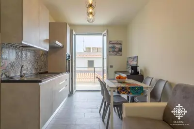 Cucina o angolo cottura di Portopalo Comfort Suite
