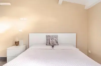 Letto o letti in una camera di Nais Old Town Charme