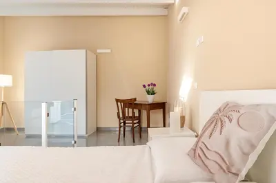 Letto o letti in una camera di Nais Old Town Charme