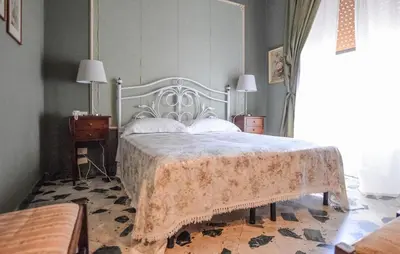 Letto o letti in una camera di 6 Bedroom Amazing Home In Noto