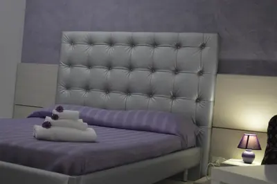 Letto o letti in una camera di Il Gheppio