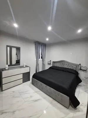 Letto o letti in una camera di Albicocche house Catania