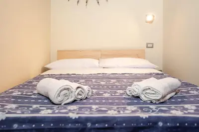 Letto o letti in una camera di Dimora delle Quattro Torri