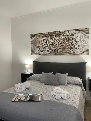 Letto o letti in una camera di Casa Caruso Holiday Home Catania