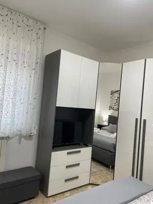 Letto o letti in una camera di Casa Caruso Holiday Home Catania