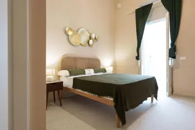 Letto o letti in una camera di Borgata Terrace Apartment