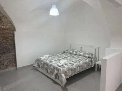 Letto o letti in una camera di La casetta del Centro