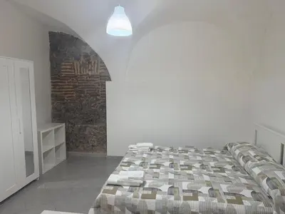 Letto o letti in una camera di La casetta del Centro