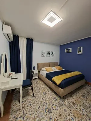 Letto o letti in una camera di B&B Piazza Mazzini