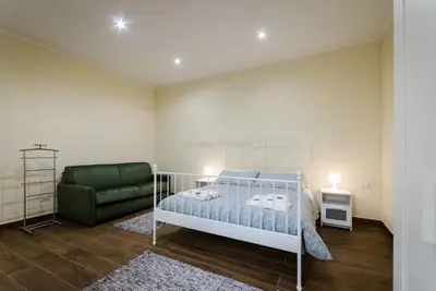 Letto o letti in una camera di Residenza Gloria