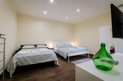 Letto o letti in una camera di Residenza Gloria