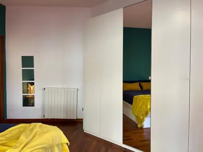 Letto o letti in una camera di Lolli House