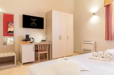 Letto o letti in una camera di Syraka Hotel LR Collection