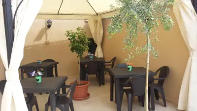 Ristorante o altro punto ristoro di Affittacamere Il Terrazzo Di Archimede