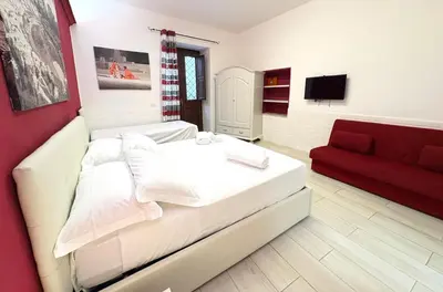 Letto o letti in una camera di Damarete
