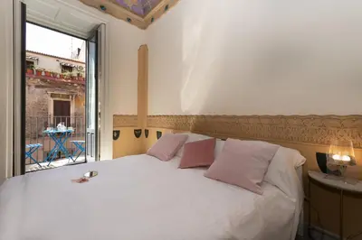 Letto o letti in una camera di Il cielo in una stanza