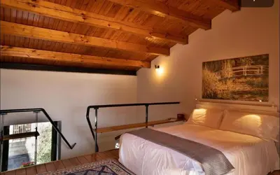 Letto o letti in una camera di Benedettini Open House