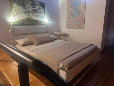 Letto o letti in una camera di Benedettini Open House