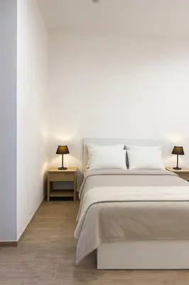 Letto o letti in una camera di Cìvitas Suite ApartHotel