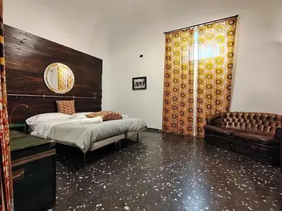 Letto o letti in una camera di Appartamento in centro con terrazzo per 11 persone