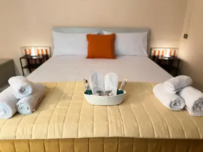 Letto o letti in una camera di HOME BUCISCA- Your days of relaxation