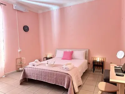 Letto o letti in una camera di HOME BUCISCA- Your days of relaxation