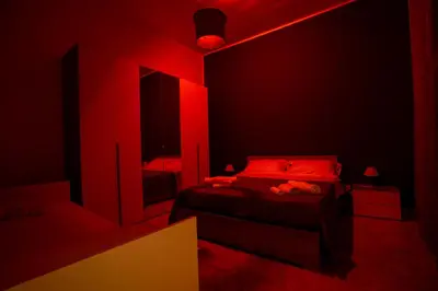 Letto o letti in una camera di A casa di amici
