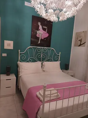 Letto o letti in una camera di B&B Il Siciliano