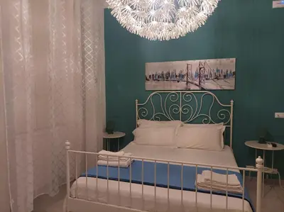 Letto o letti in una camera di B&B Il Siciliano