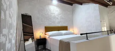Letto o letti in una camera di Raggiu di Suli